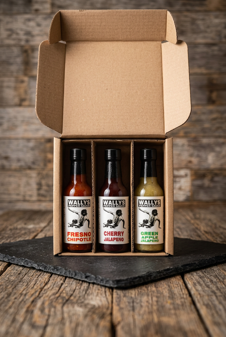 Wallys 3-pack gift box on black slate on a wood table
