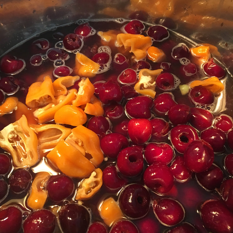 Cherries and habaneros simmering in Wally's pot