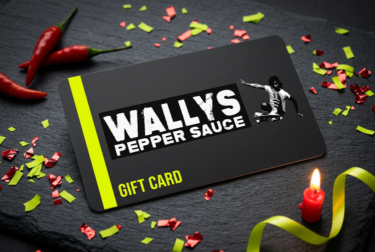 Wallys Pepper Sauce gift card with confetti, chilies and a birthday candle
